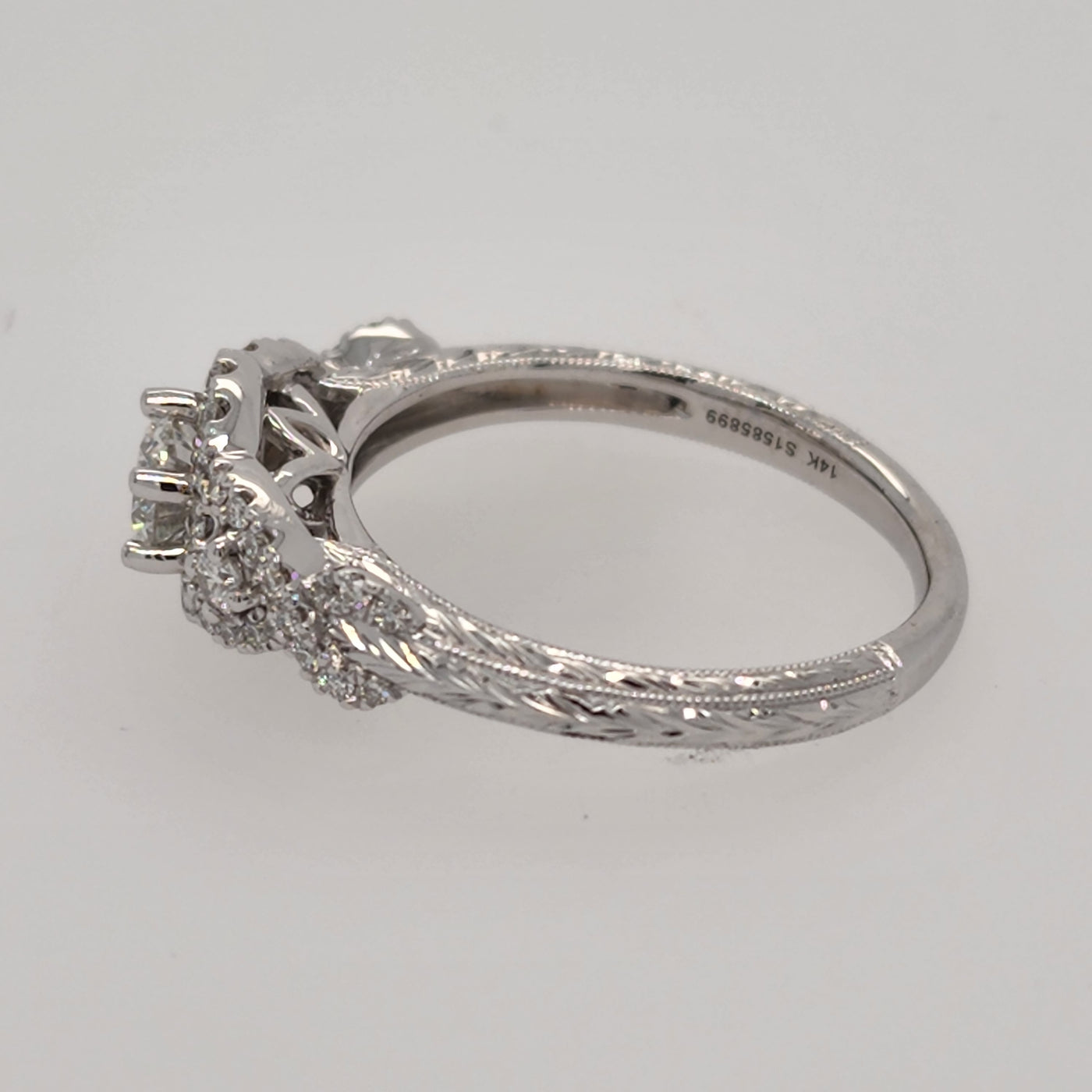 White Gold Engagement Ring With Floral Design