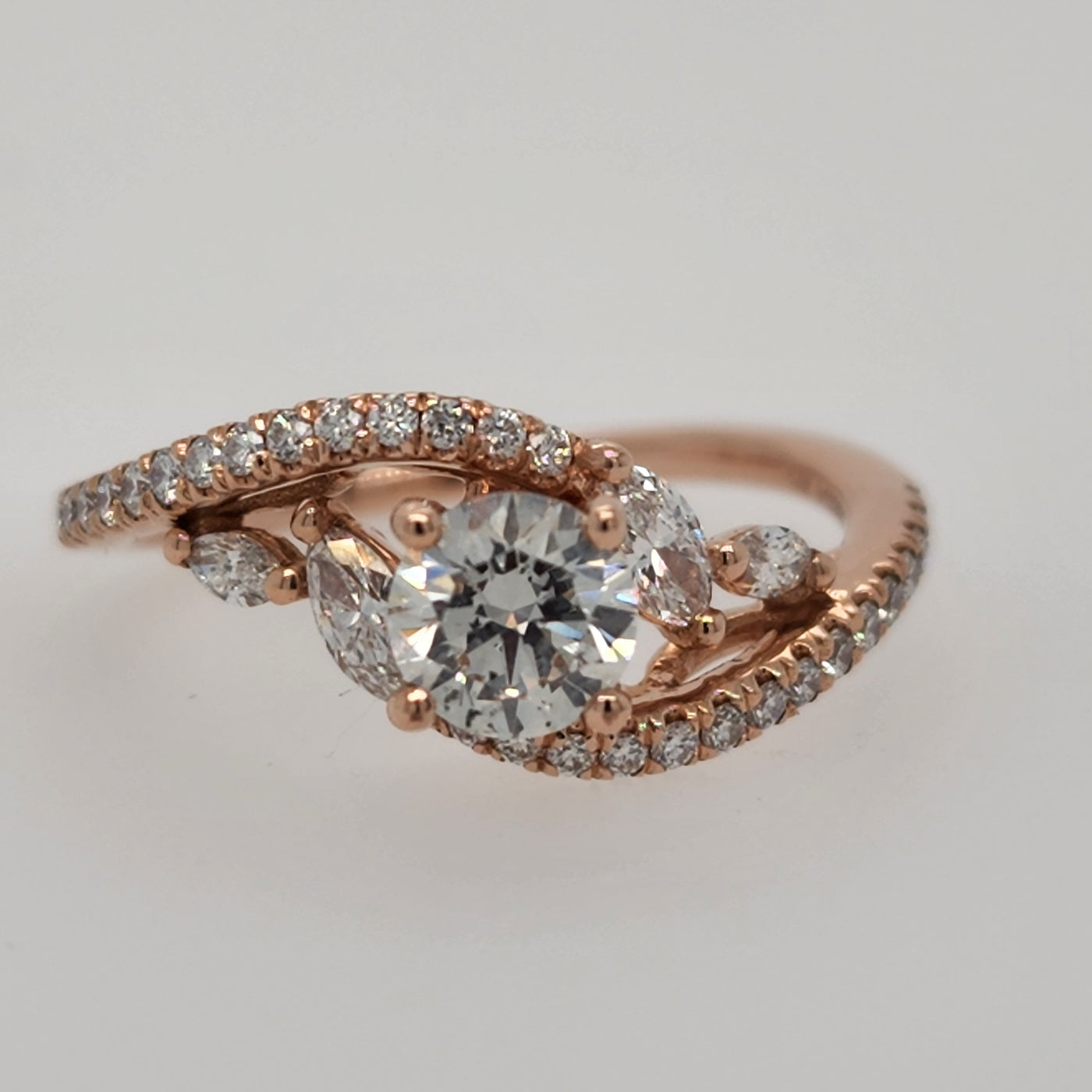 Rose Gold Engagement Ring With Round and Marquise Accent Stones