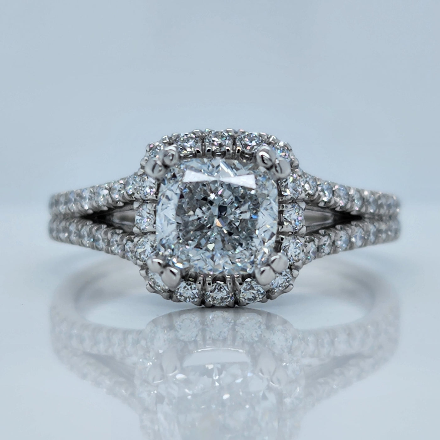White Gold Engagement Ring With Cushion Cut Diamond and Round Accents