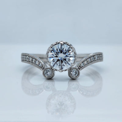 Custom White Gold Engagement Ring With Round Diamond Center and Round Accent Diamonds