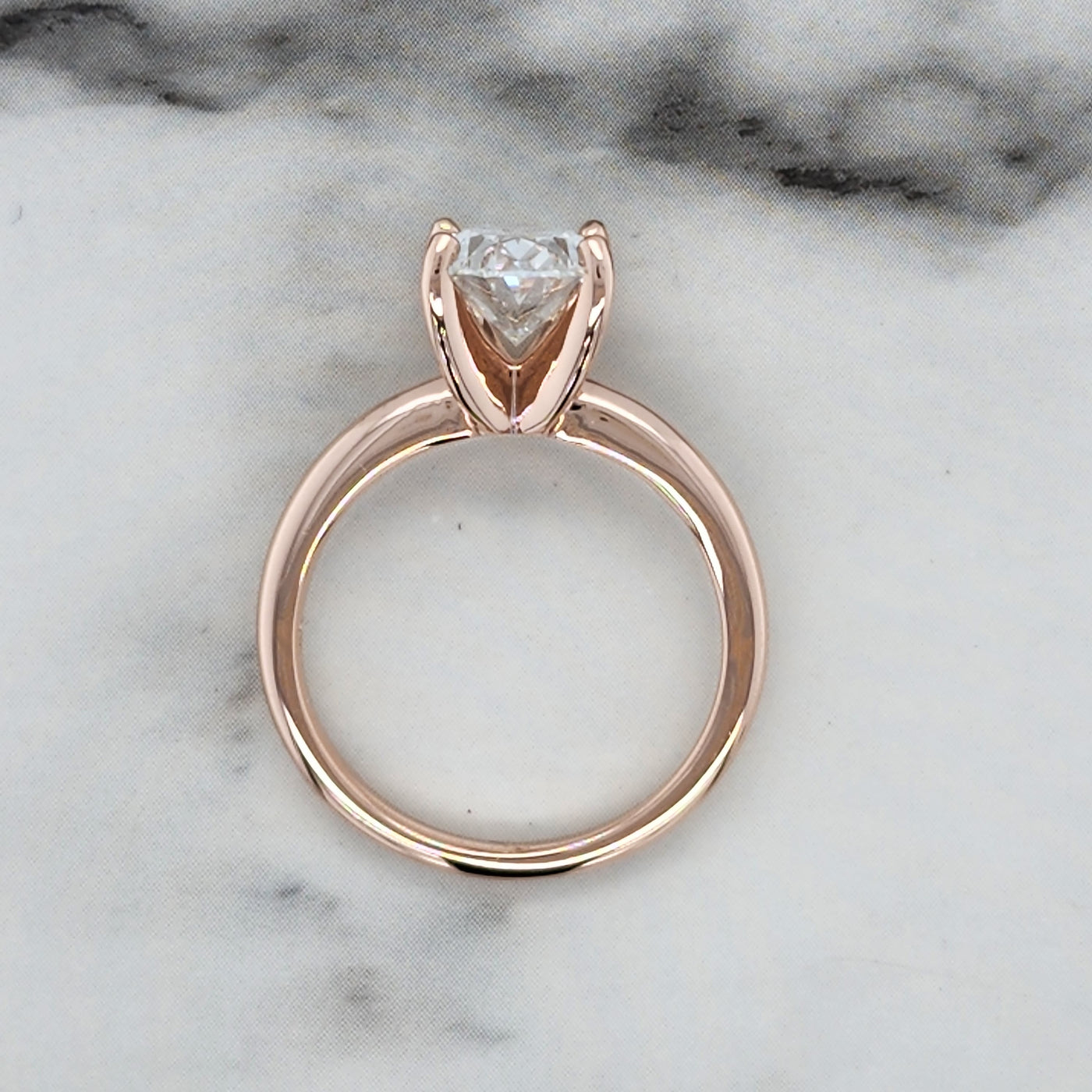 Rose Gold Solitaire Engagement Ring With Oval Center Diamond