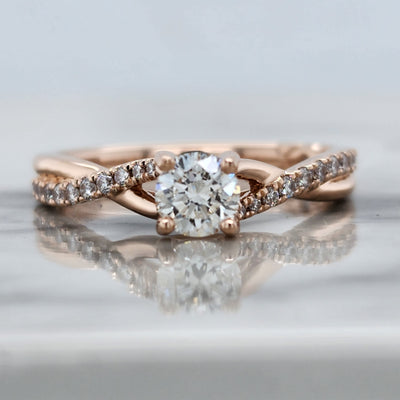 Rose Gold Engagement Ring With Round Center Diamond and Twist Design