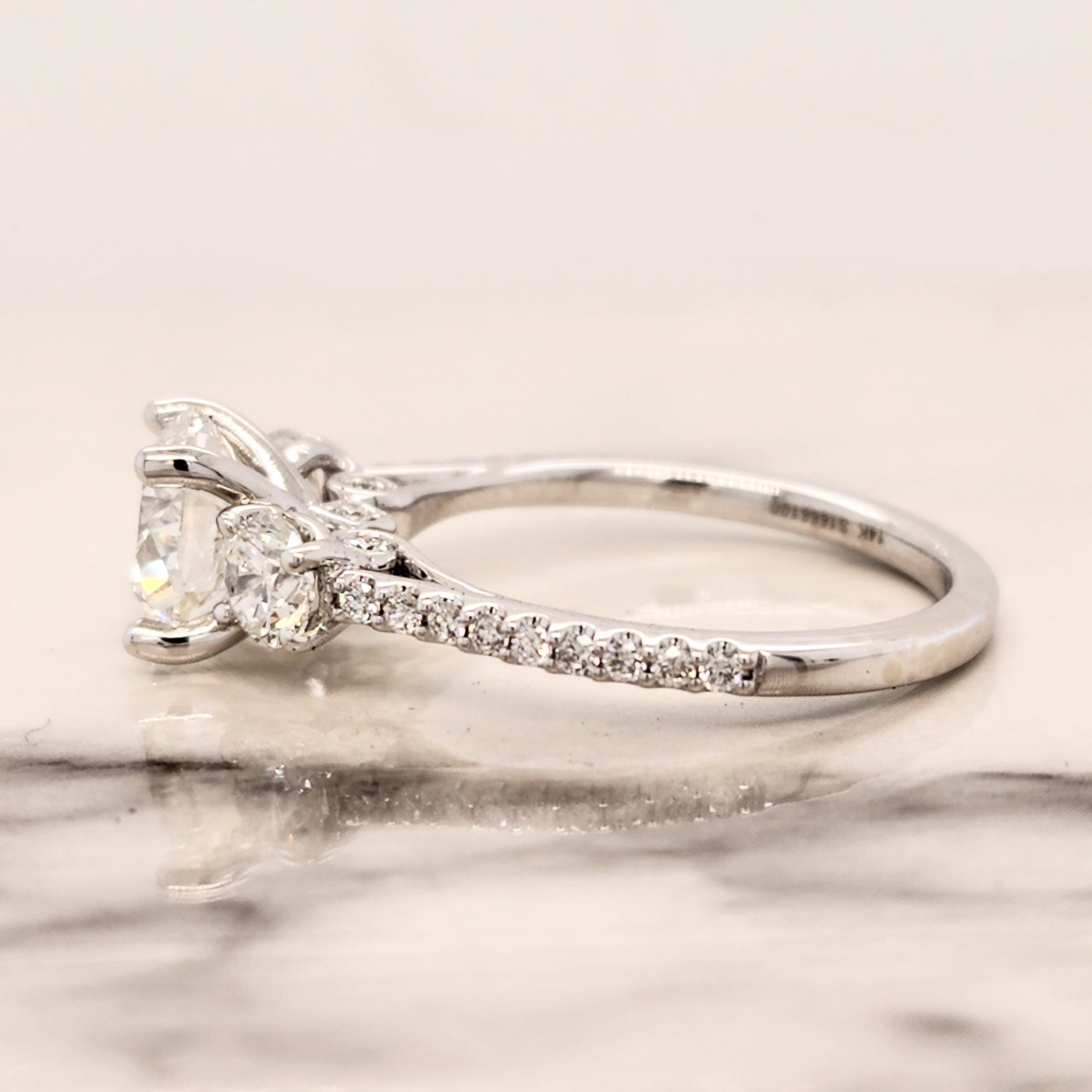 White Gold 3 Stone Engagement Ring With Round Center Diamond and Round Accents