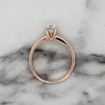 Rose Gold Solitaire Engagement Ring With Round Center Stone