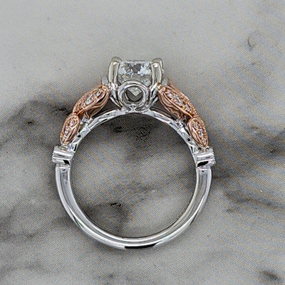 2 tone white and rose gold engagement ring with floral detail