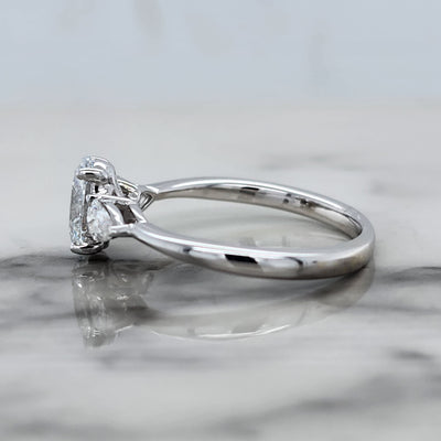White Gold 3 Stone Engagement Ring With Oval And Pear Shaped Diamonds