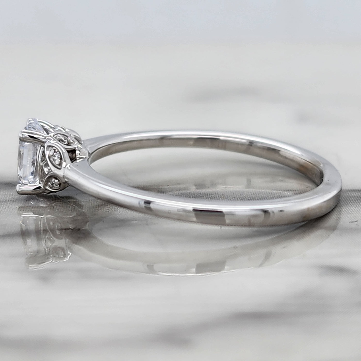 Dainty White Gold Engagement Ring With Oval Center