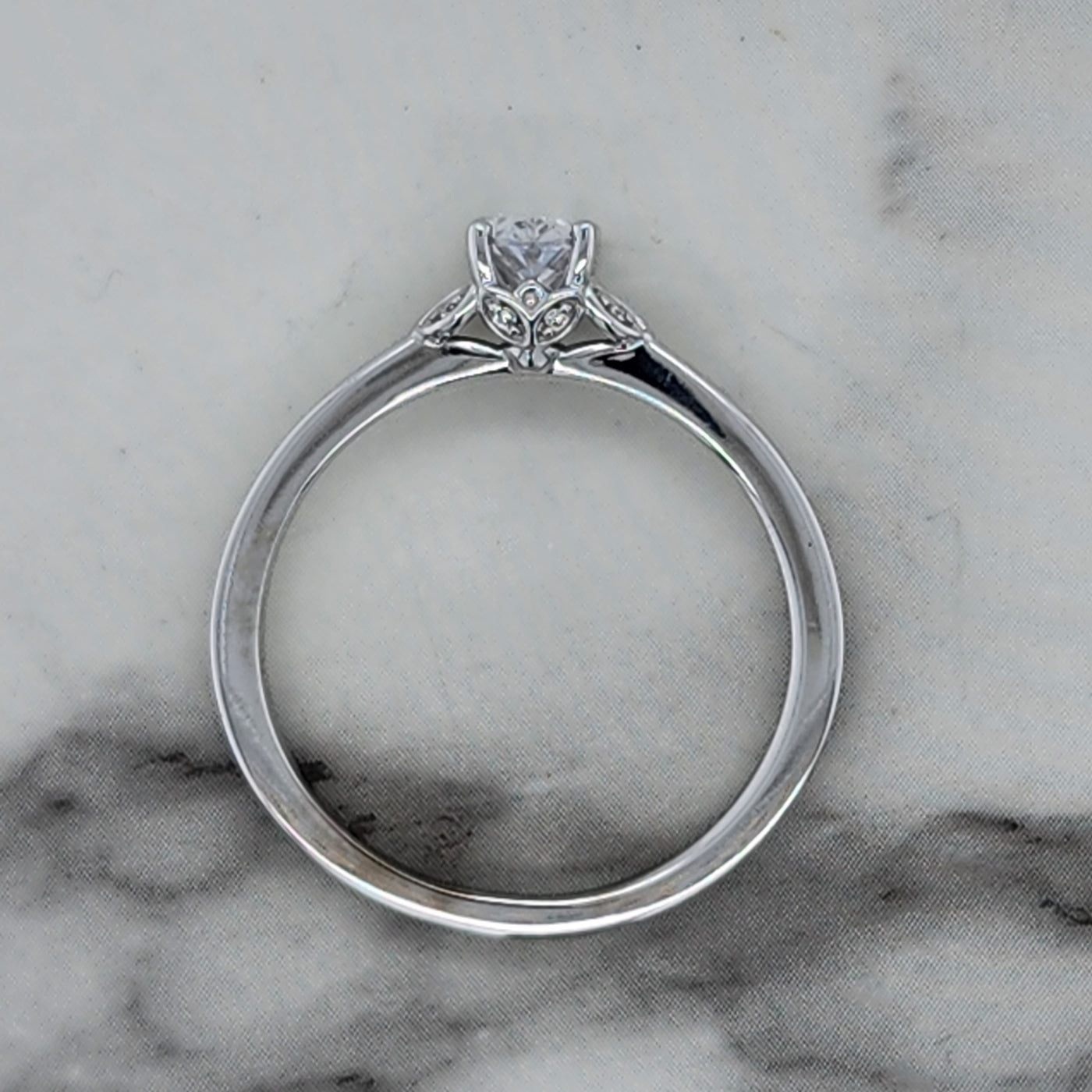 Dainty White Gold Engagement Ring With Oval Center