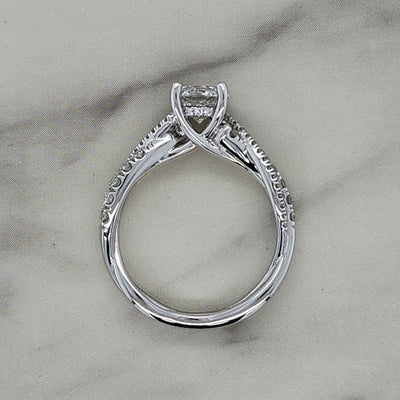Twisted White Gold Round Engagement Ring With Round Diamond Accents