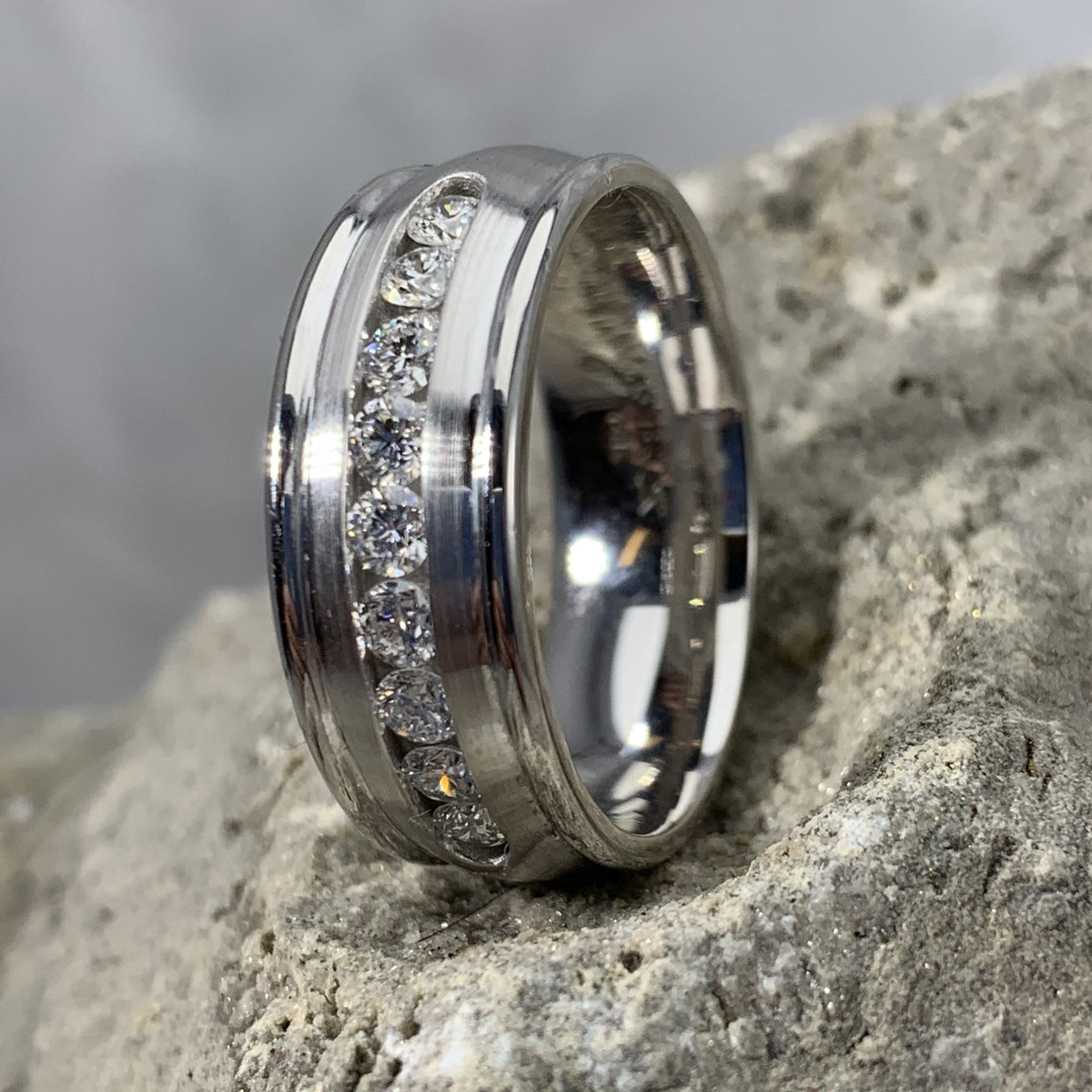 white gold wedding band with channel set diamonds and satin finish