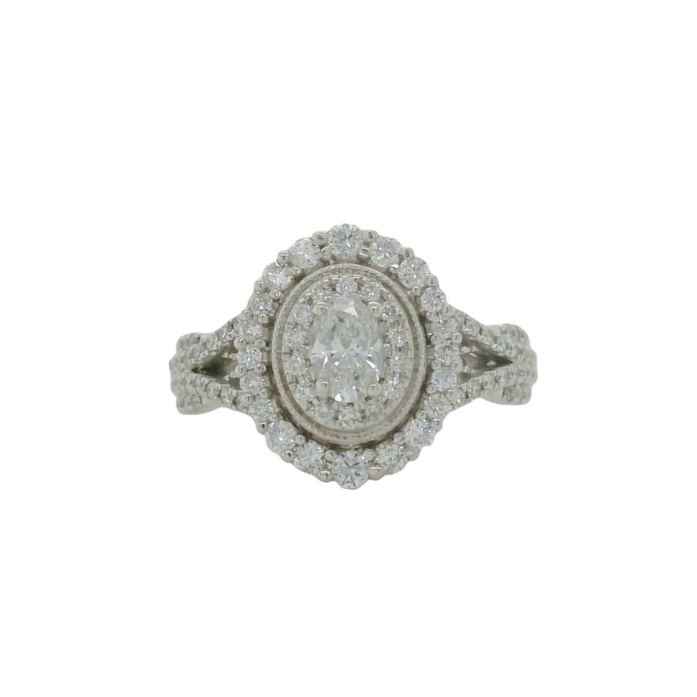 white gold oval engagement ring with double halo and accent diamonds