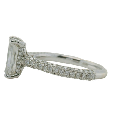 white gold radiant cut engagement ring with hidden halo and micropave accent diamonds