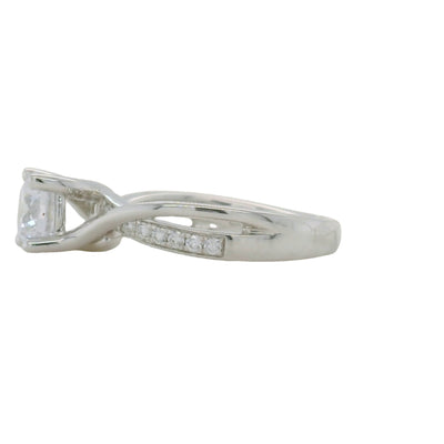 white gold semi mount engagement ring with round diamond accent stones and twist design