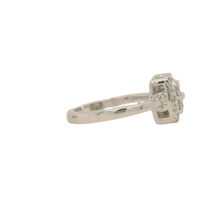 white gold cushion shaped cluster engagement ring with accent diamonds