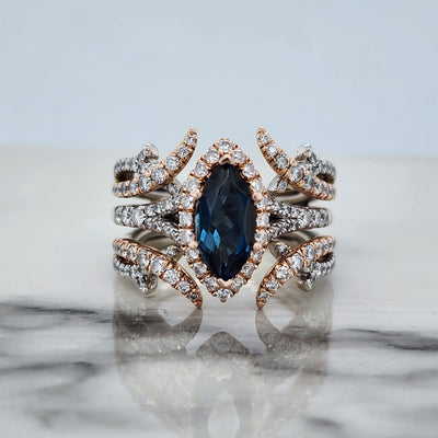 2 tone engagement ring with enhancer featuring london blue topaz