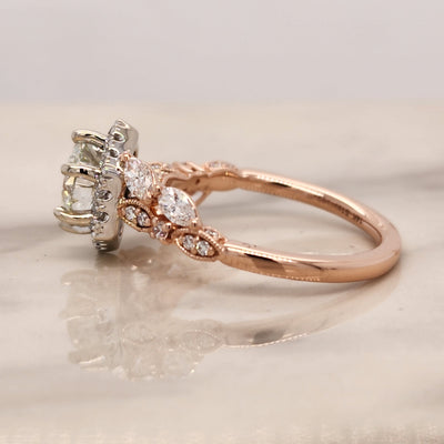 2 tone rose and white gold engagement ring with hexagon halo and marquise accents