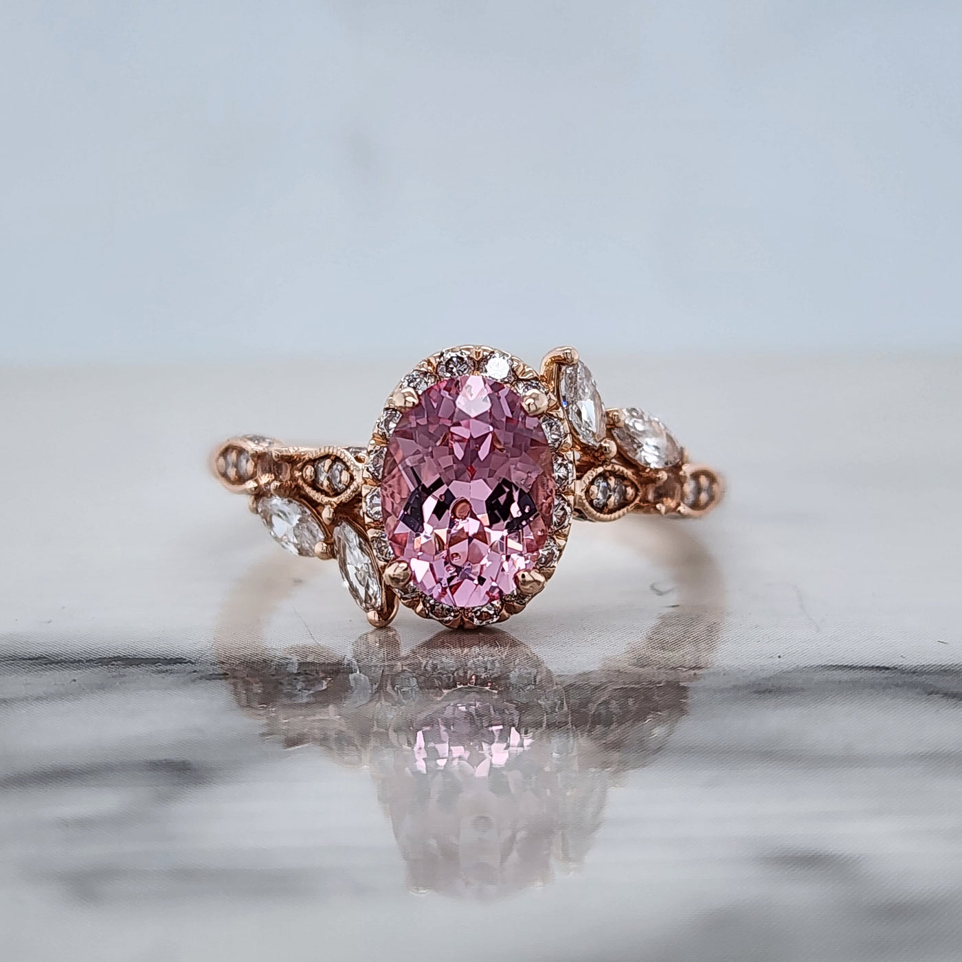 Custom Rose Gold Engagement Ring Featuring Pink Sapphire and Diamond Accents