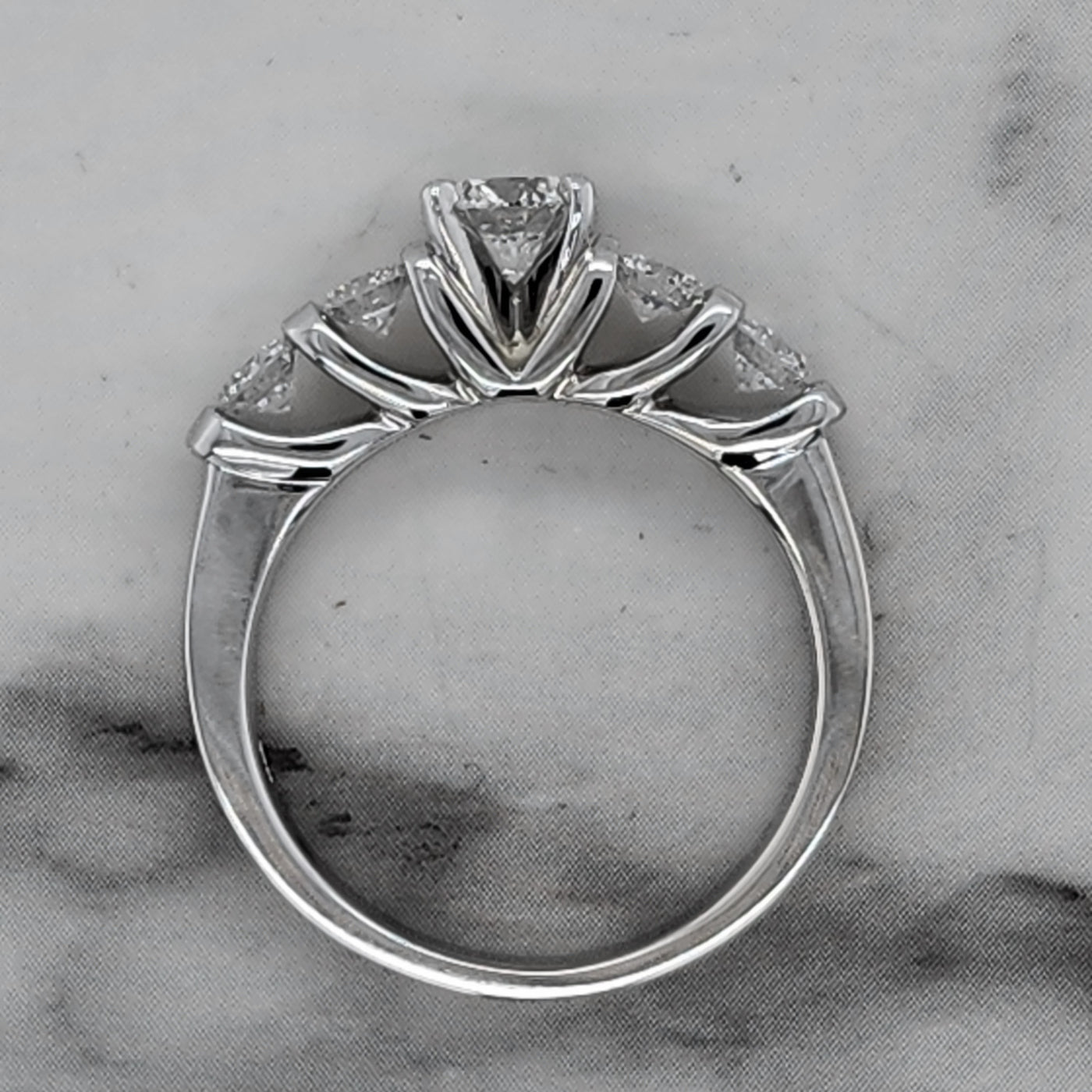 White Gold Engagement Ring With Round Center and Round Channel Set Accent Stones