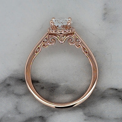 Custom Rose Gold Engagement Ring With Oval Center Stone and Diamond Halo