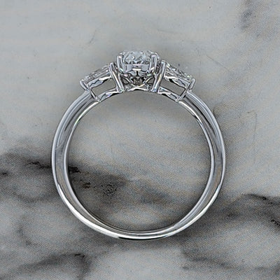 White Gold 3 Stone Engagement Ring With Oval And Pear Shaped Diamonds