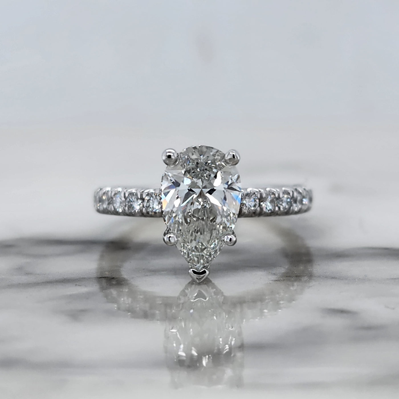 White Gold Pear Engagement Ring With Hidden Halo and Accent Diamonds