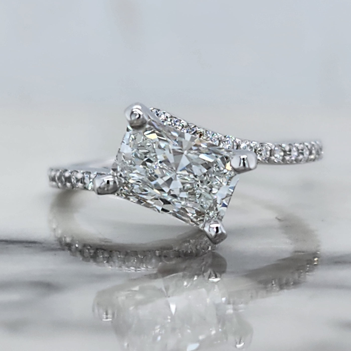 White Gold Radiant Cut Engagement Ring With Diamond Side Stones