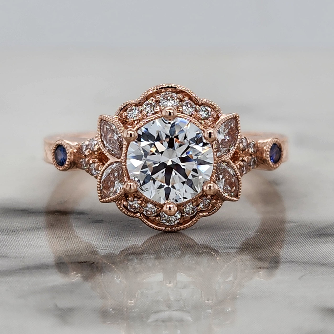 Custom Rose Gold Floral Engagement Ring With Sapphire and Diamond Accents