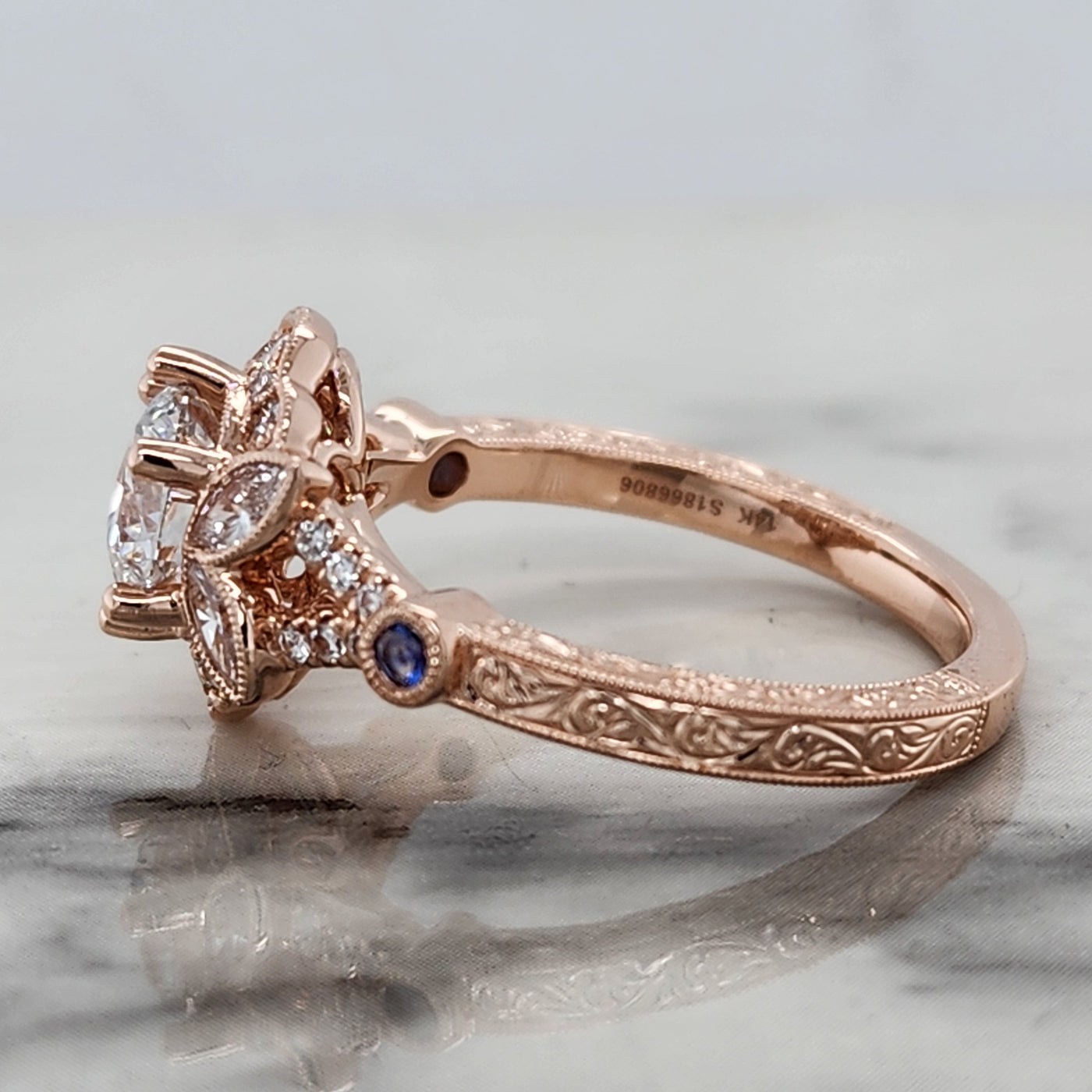 Custom Rose Gold Floral Engagement Ring With Sapphire and Diamond Accents