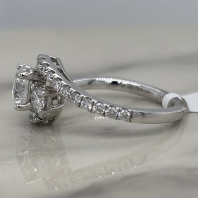 white gold 3 stone round engagement ring with accent diamonds