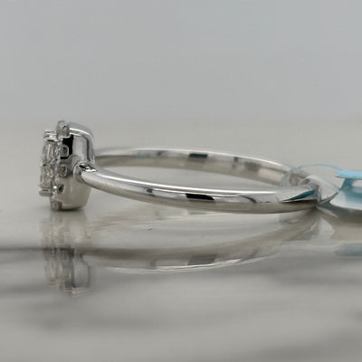 white gold diamond cluster solitaire engagement ring