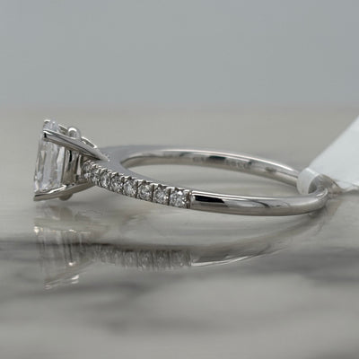 14k white gold semi mount engagement ring with oval center stone and diamond accent stones
