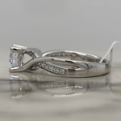 white gold semi mount engagement ring with round diamond accent stones and twist design