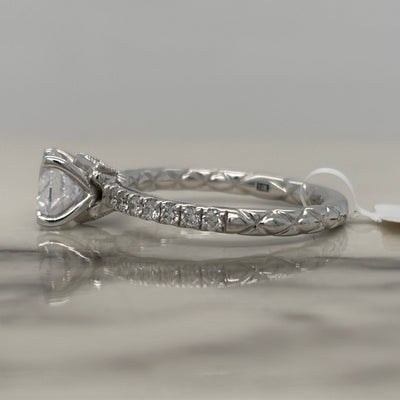 14k white gold round engagement ring with round accent diamonds