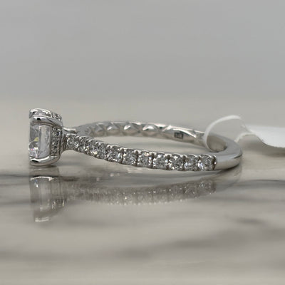 14k round white gold engagement ring with hidden halo and accent diamonds