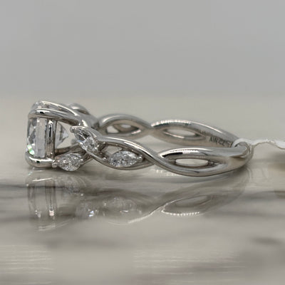 White Gold Round Engagement Ring With Floral Marquise Diamond Accents and Twist Design