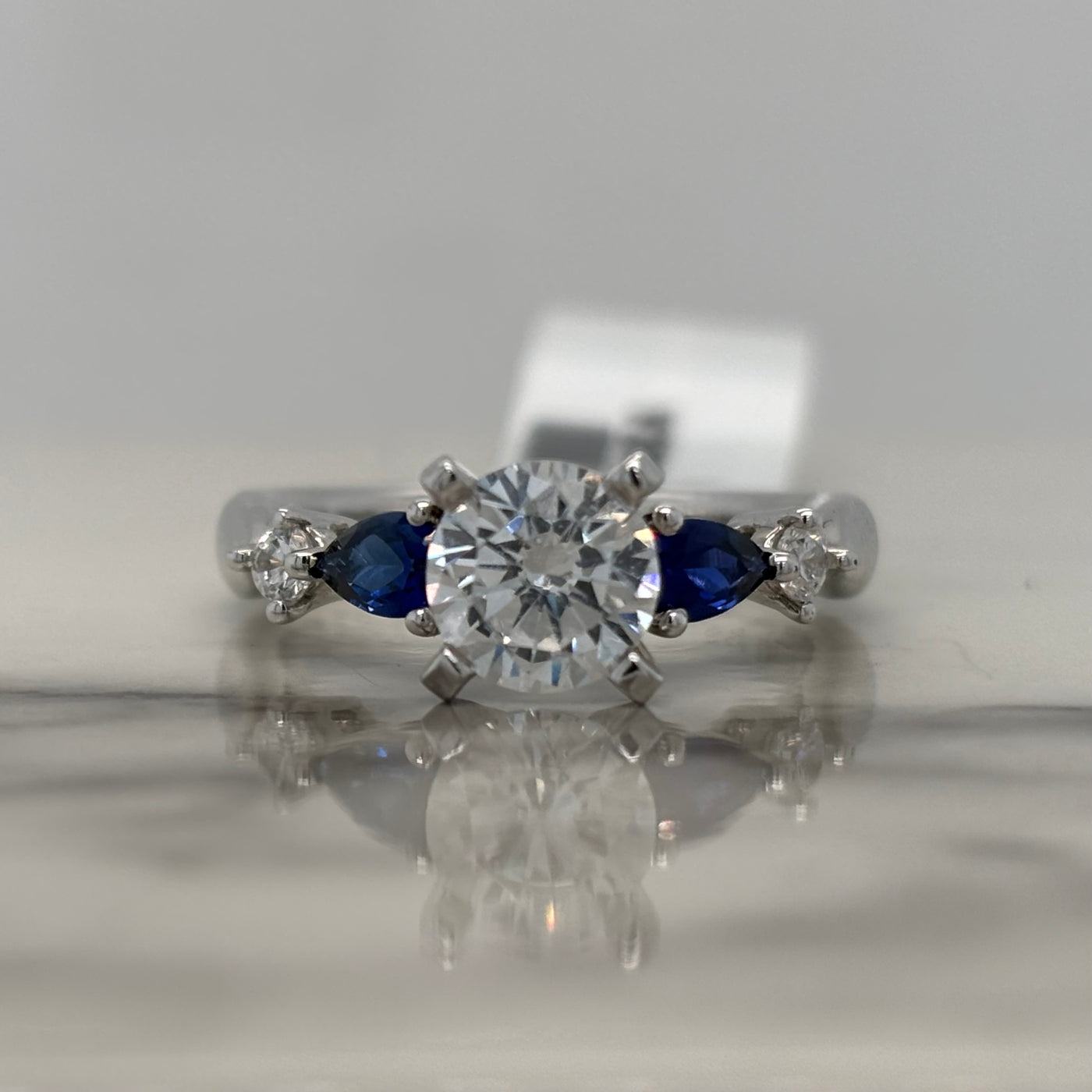 White Gold Round Engagement Ring With Sapphire and Diamond Accents