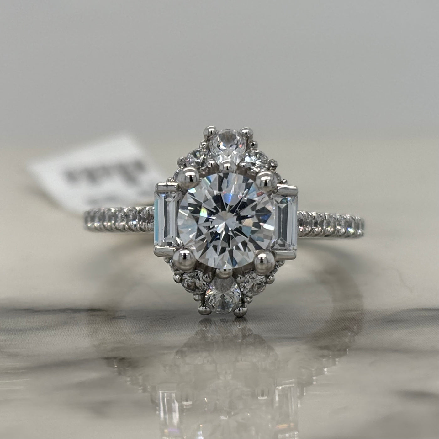 White Gold Round Engagement Ring With Art Deco Style Halo and Accent Diamonds