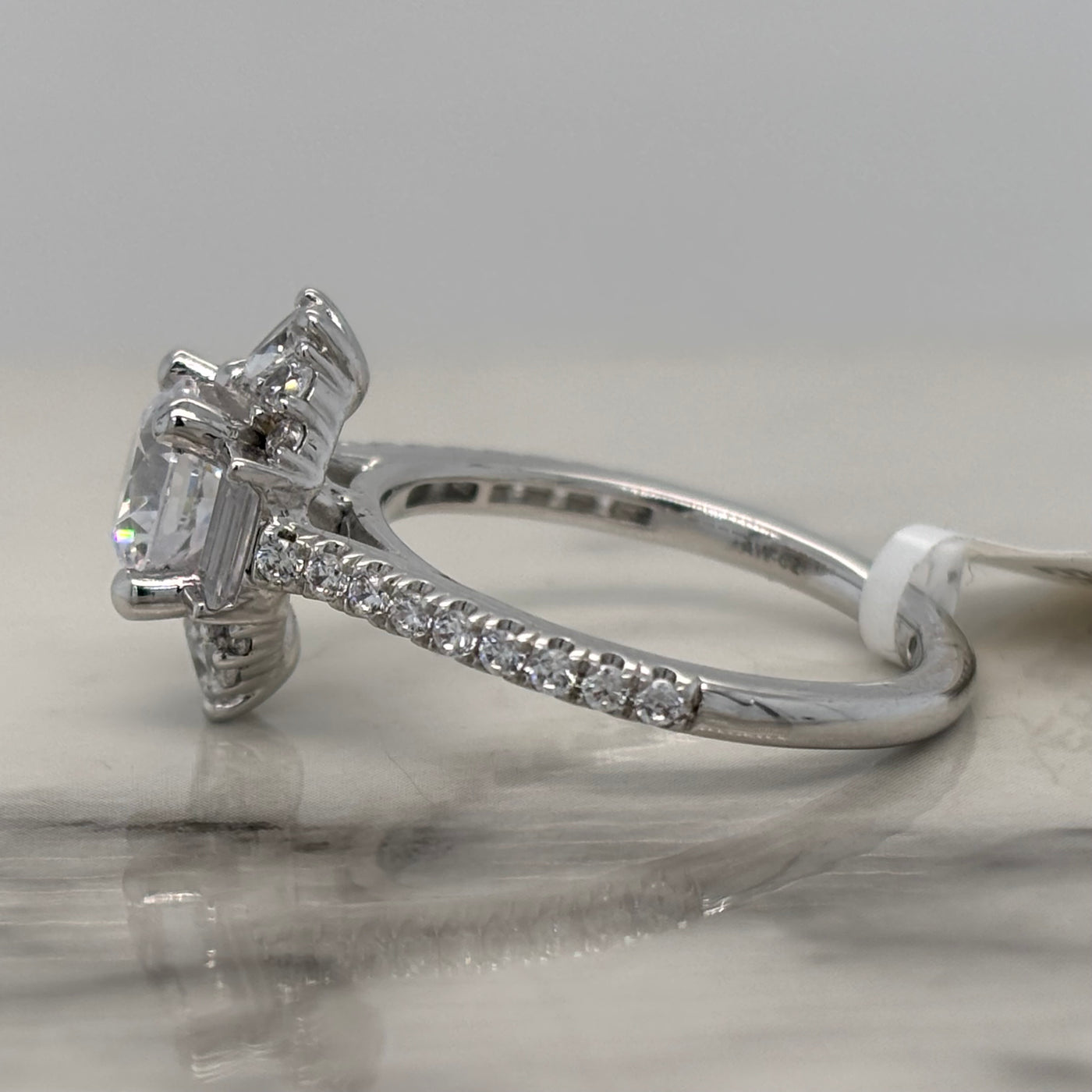 White Gold Round Engagement Ring With Art Deco Style Halo and Accent Diamonds