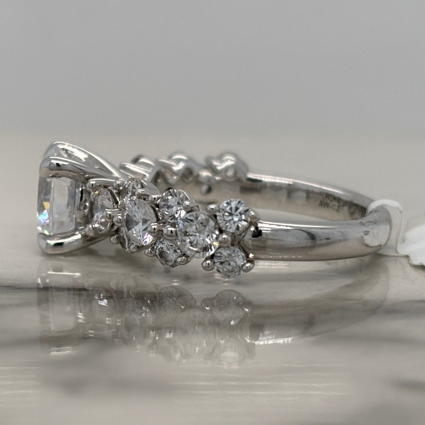 White Gold Round Engagement Ring With Diamond Cluster Accents