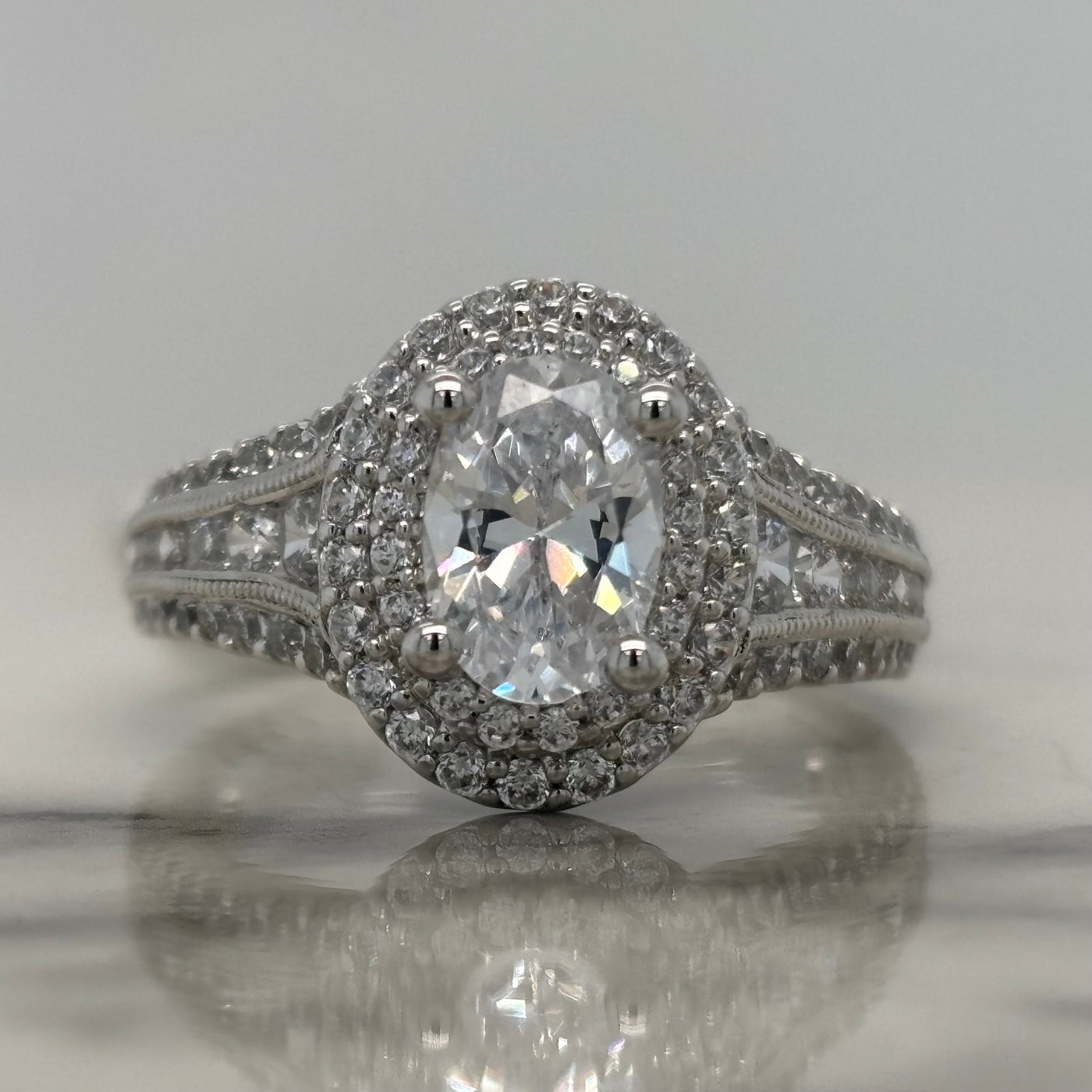 White Gold Oval Engagement Ring With Double Halo and Accent Diamonds