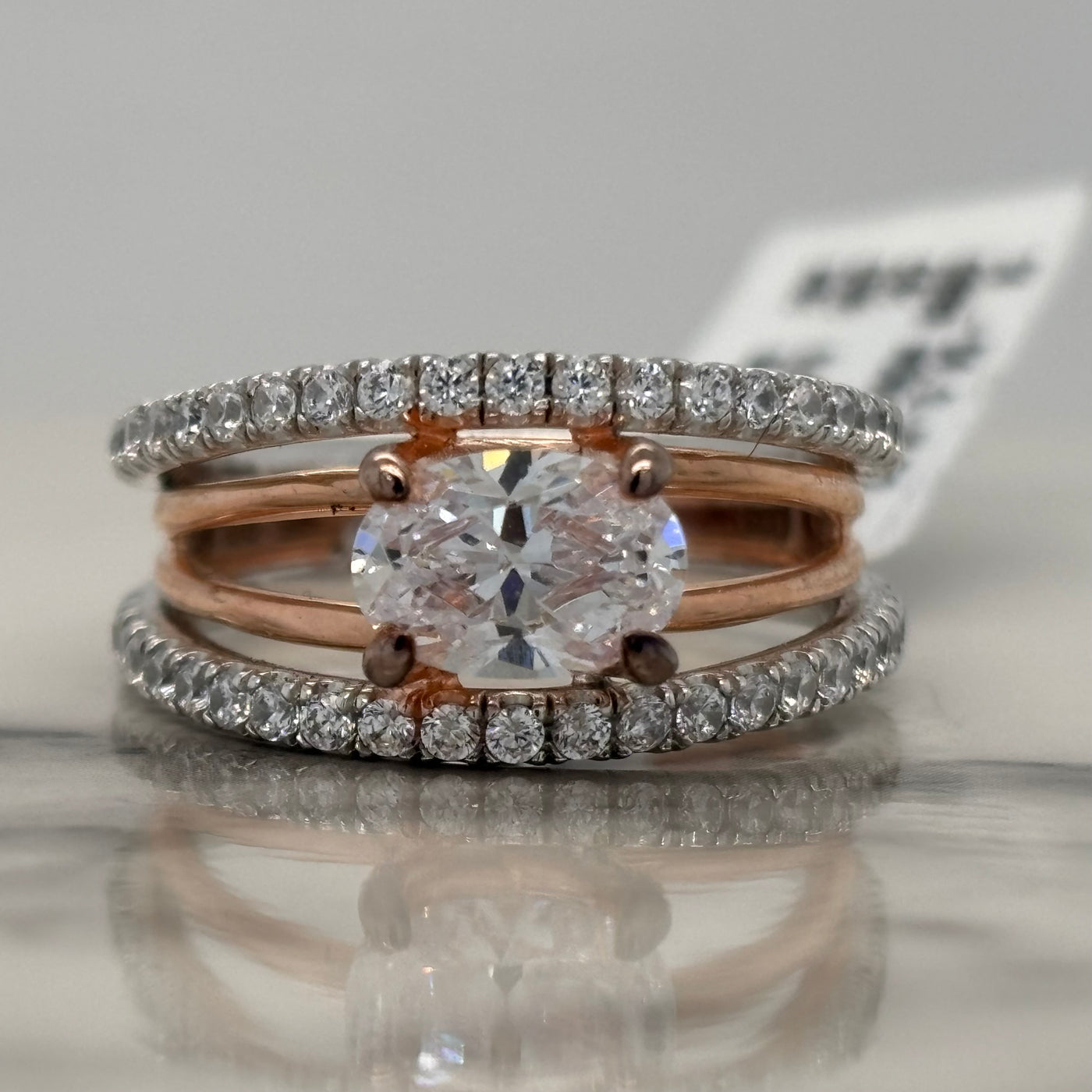 2 Tone White and Rose Gold East West Set Oval Engagement Ring With Accent Diamonds
