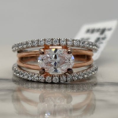 2 Tone White and Rose Gold East West Set Oval Engagement Ring With Accent Diamonds