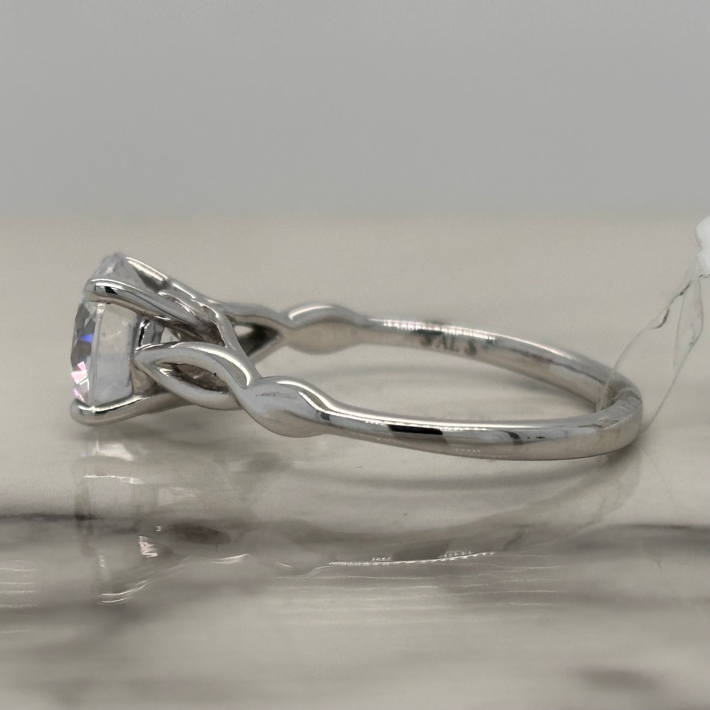 White Gold Solitaire Engagement Ring With Twist Design