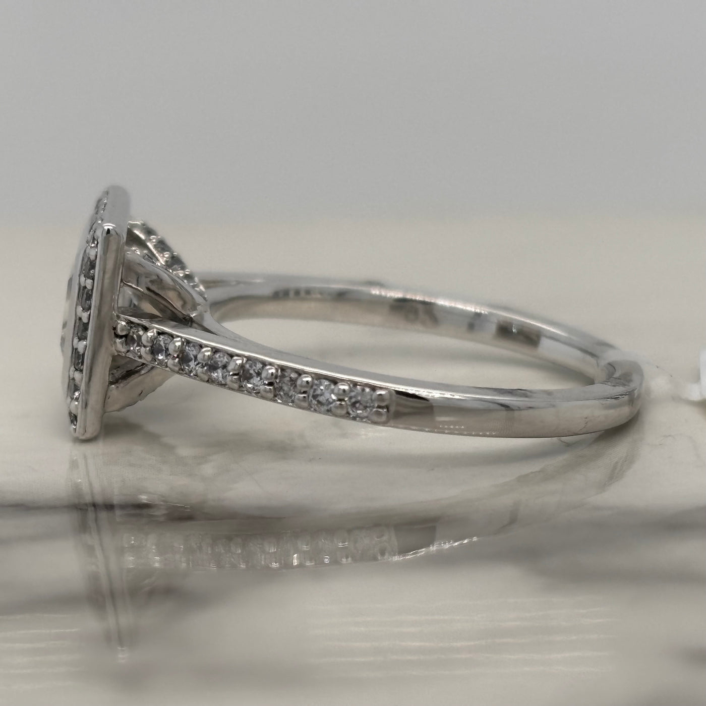 White Gold Princess Cut Bezel Set Engagement Ring With Halo and Accent Diamonds
