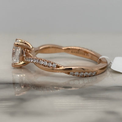 Rose Gold Oval Engagement Ring With Twist Design and Accent Diamonds