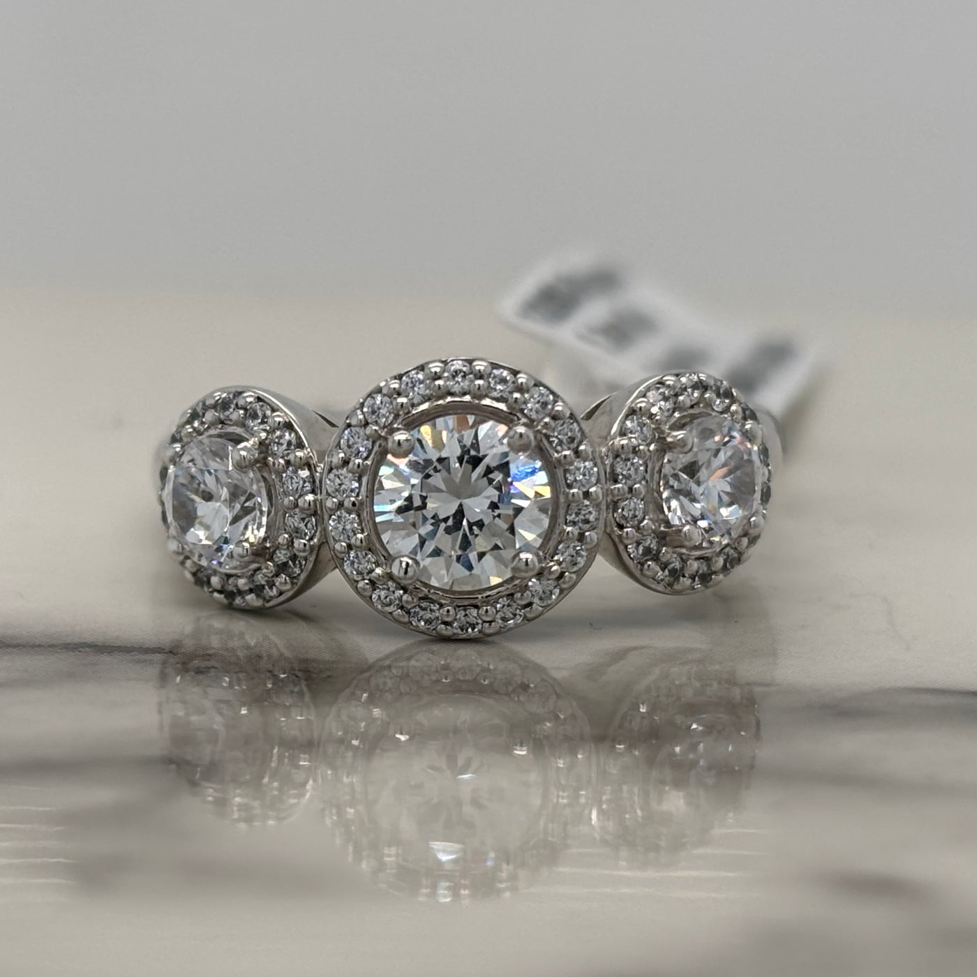 White Gold Round 3 Stone Halo Engagement Ring