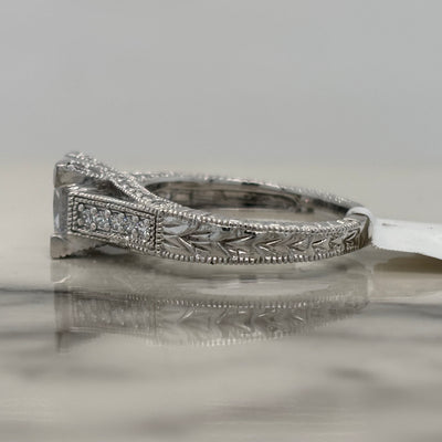 White Gold Princess Cut V-Prong Engagement Ring With Round Accent Diamonds and Milgrain Detail
