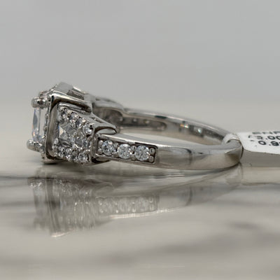 White Gold 3 Stone Princess Cut Engagement Ring With Tapered Baguette Side Stones and Halo