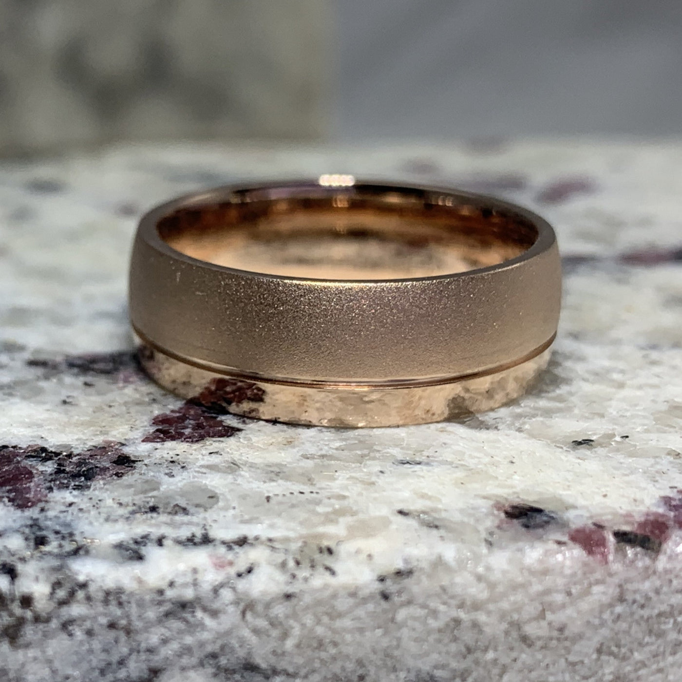 rose gold wedding band with stipple and polished finish