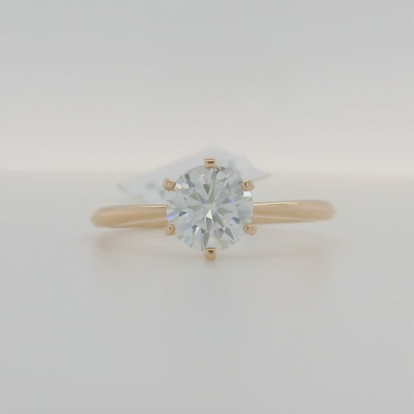 yellow gold round solitaire engagement ring